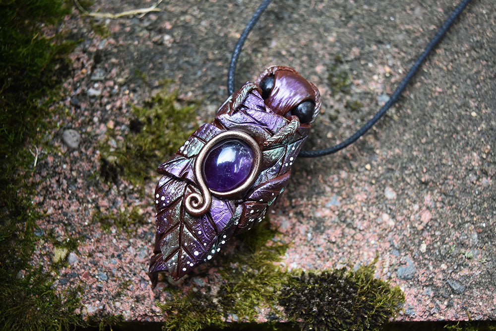 Emerging Moth Cocoon with Amethyst Necklace